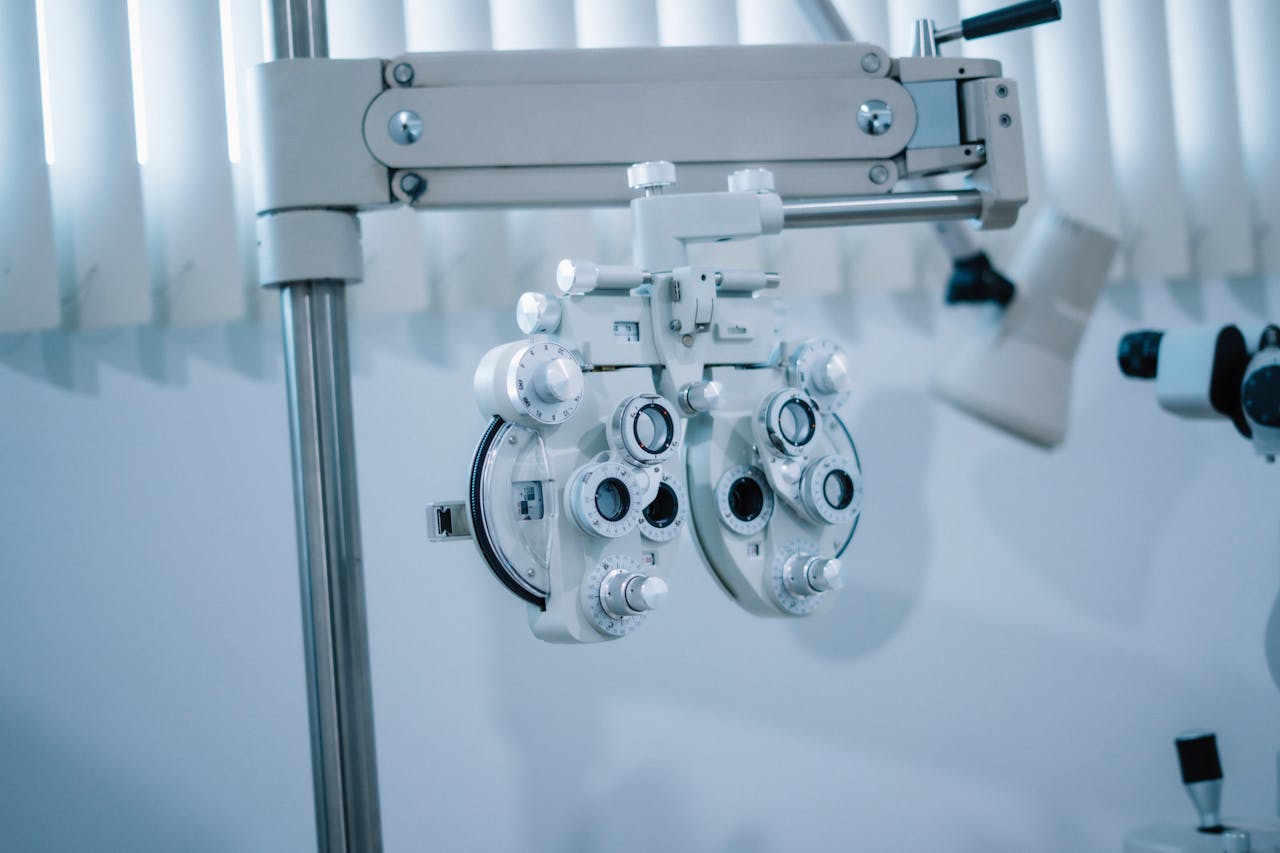 Mastering the First Impression: Your intriguing post title goes here Detailed view of an optical phoropter in a modern eye clinic, used for testing vision clarity.